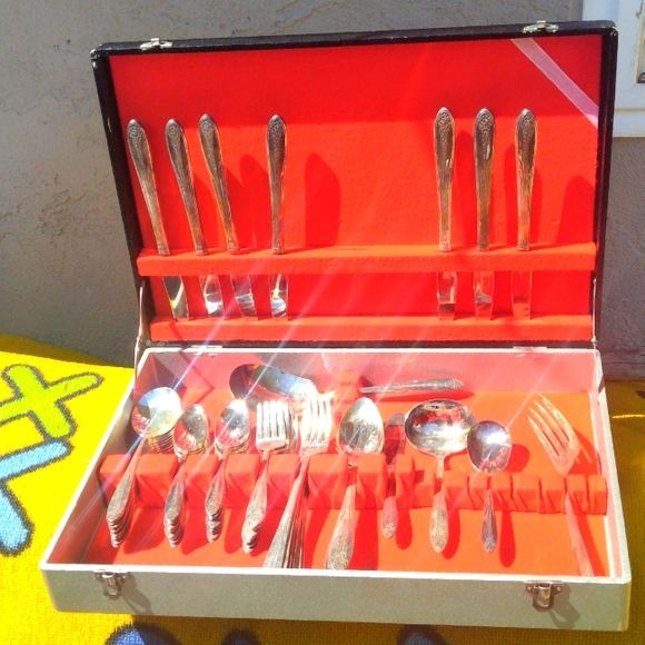 A almost set of National double tested silver plated silverware